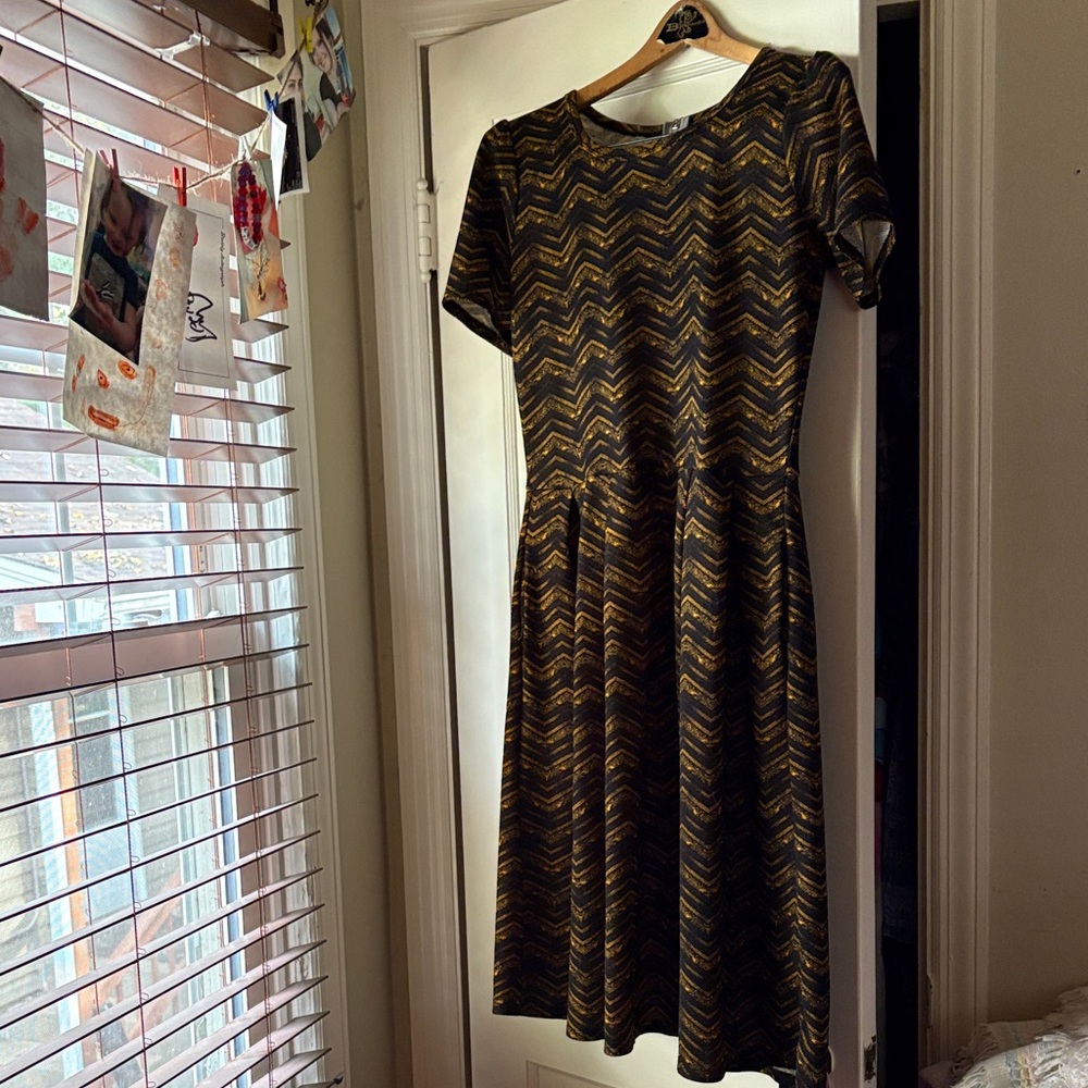 Super cute chevron dress with zip-up back.  Great for Halloween party!